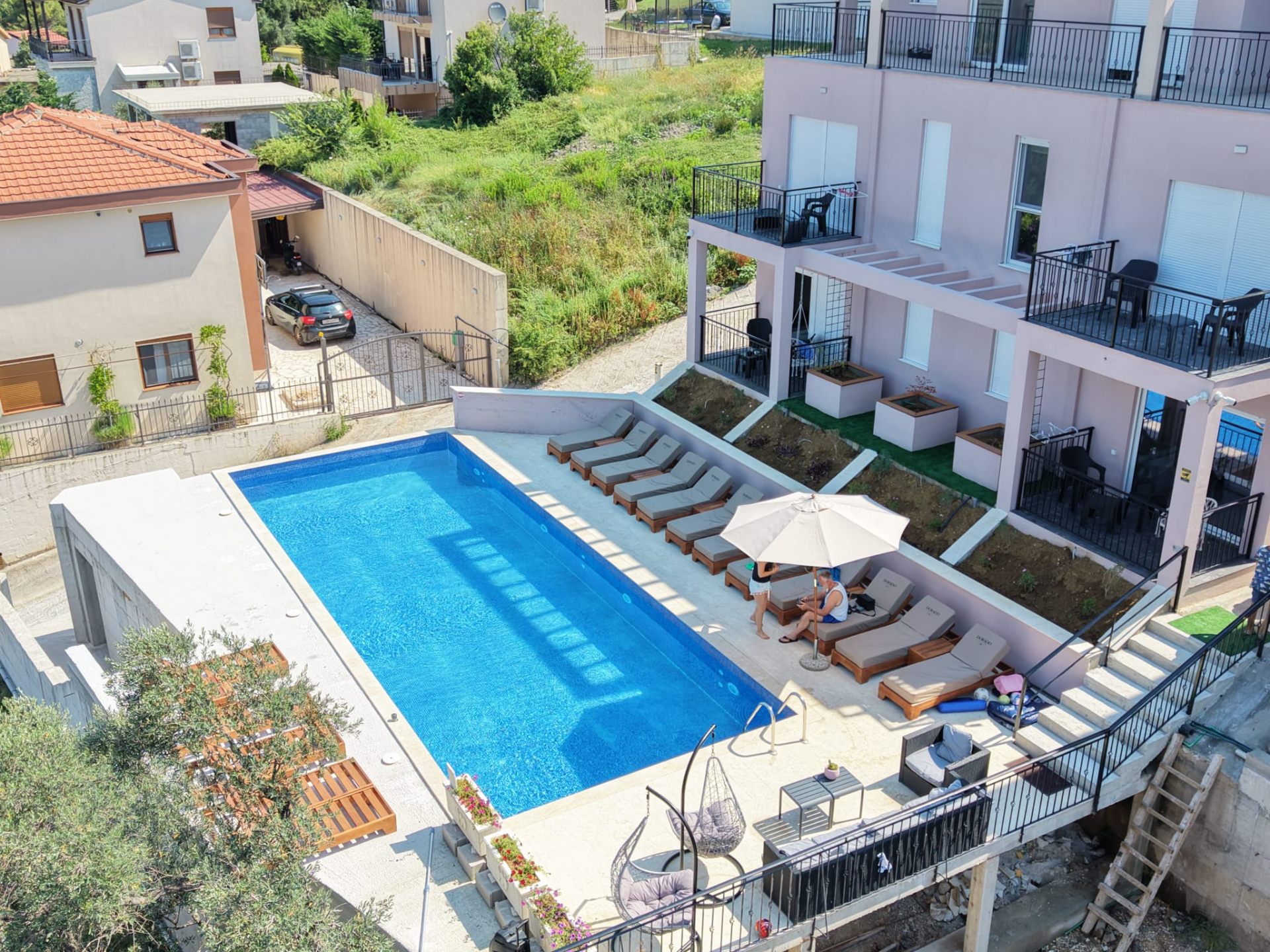 Aerial view of Dorado Apartments above the Bay of Kotor